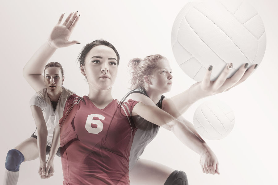 Young Female Volleyball Player Isolated On White Studio Background. Woman In Sports Equipment And Sh